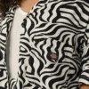 Camicia da lavoro da donna con stampa zebrata Camicia da lavoro da donna con stampa zebrata