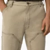 Pantaloni in tela di cotone con doppio rinforzo sulle ginocchia e cuciture a contrasto