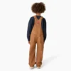 Salopette in tela cerata per bambini